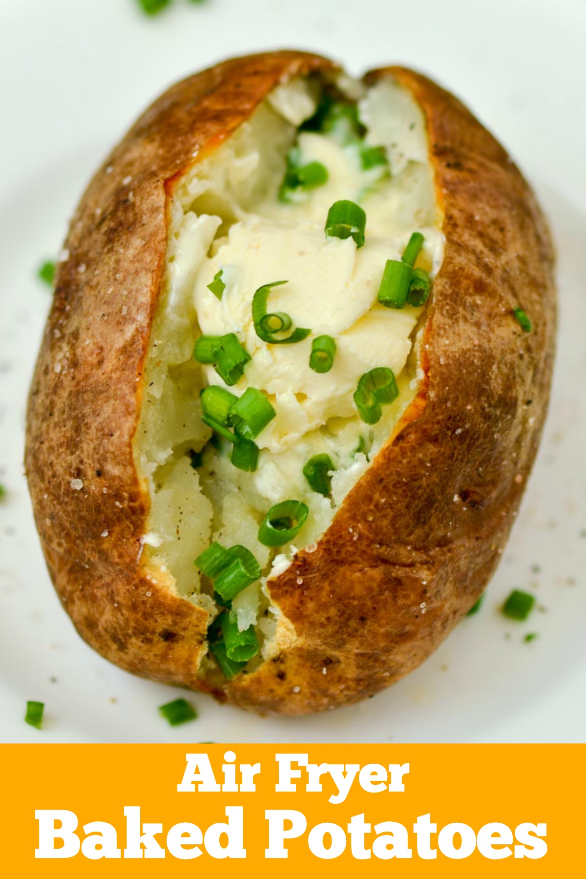 Dairy-free butter and chives on a baked potato cooked in an air fryer. 