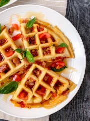 A drizzle of maple syrup over the gluten-free stuffed waffles.