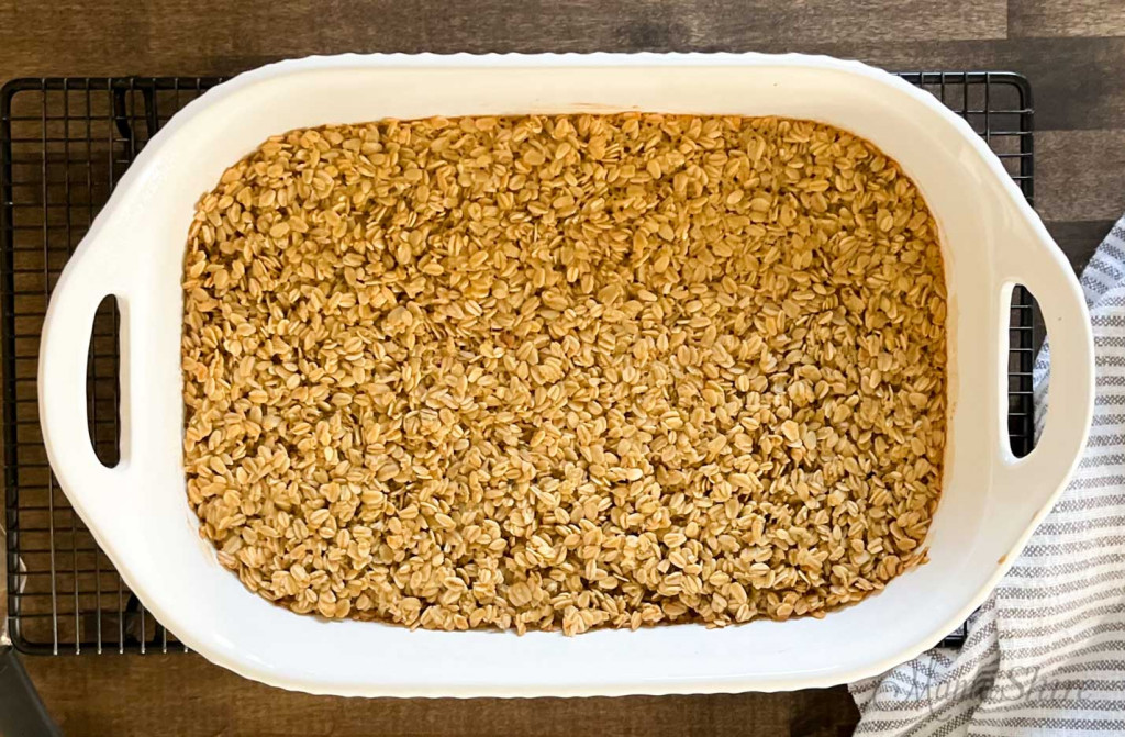 A white 9x13-inch baking pan with gluten-free baked oatmeal. 