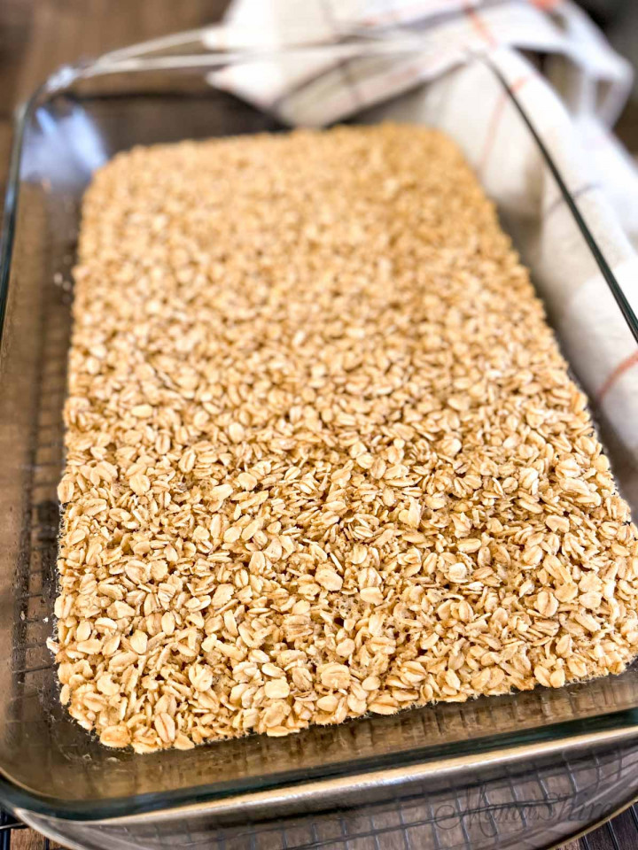 A 9x13-inch baking pan with freshly baked oatmeal.