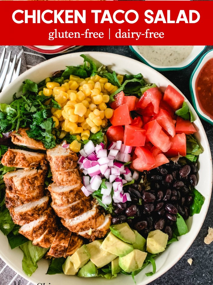 Healthy Chicken Taco Salad with black beans, corn, avocados, and tomatoes.