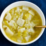 A bowl of leek and potato soup.
