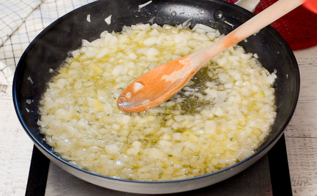 Cooking onions in dairy-free butter.
