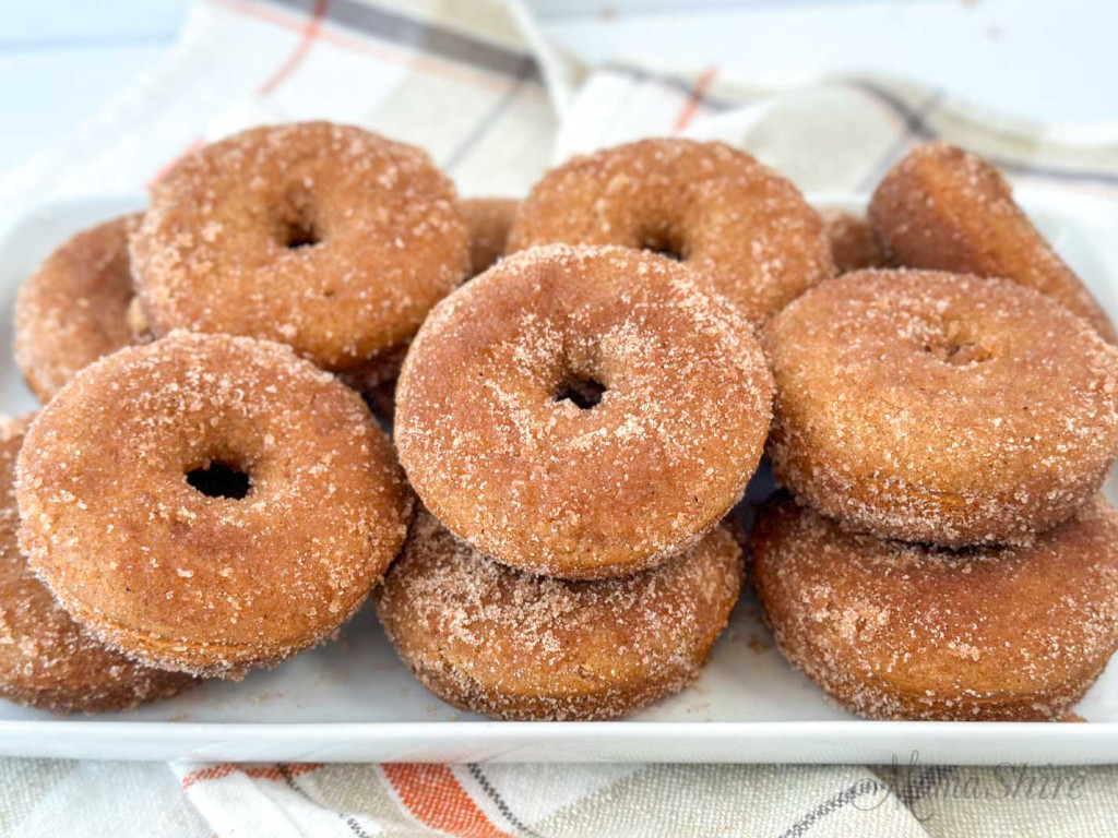A platter of gluten-free apple cider donuts.
