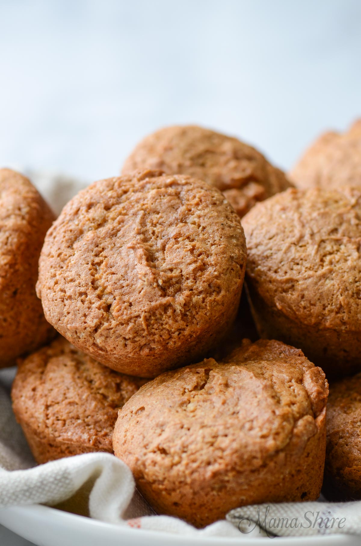 A basket of gluten-free applesauce muffins that are also dairy-free. 