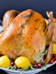 A delicious herb roasted turkey with lemons and herbs.