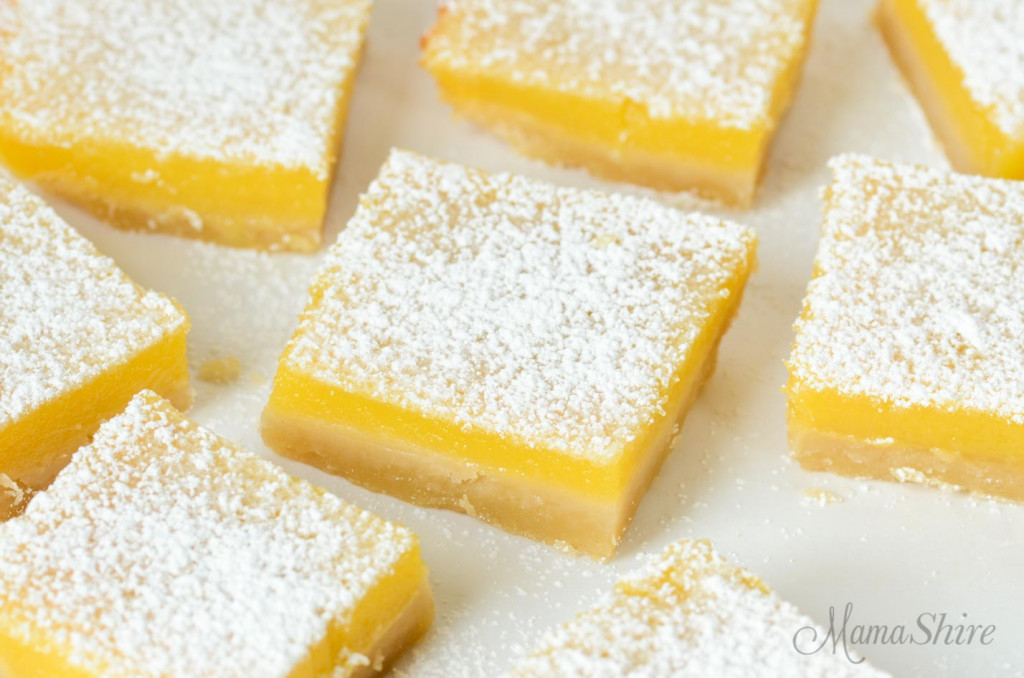 Gluten-Free Lemon Bars with dusted with powdered sugar.