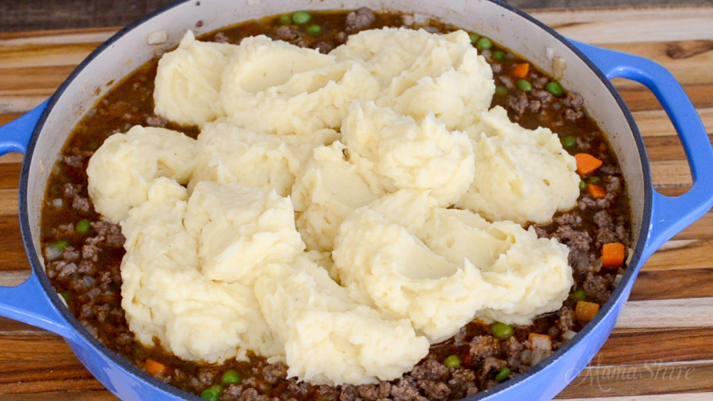 Dairy-free mashed potatoes dolloped over a ground beef mixture.