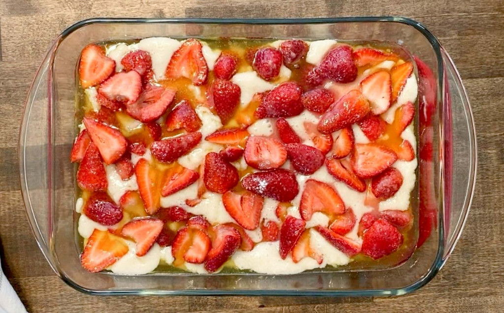 Fresh strawberries on top of batter to make a delicious gluten-free cobbler