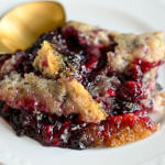 A closeup of gluten-free triple berry cobbler.