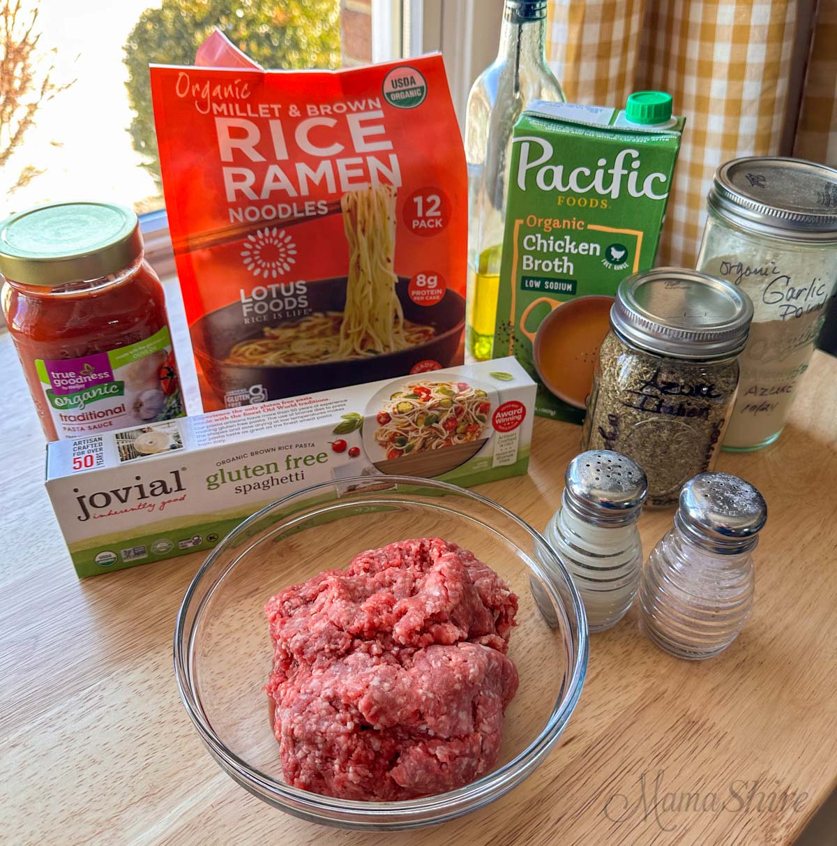 Ingredients for gluten-free spaghetti all out on a table.
