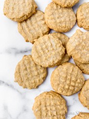 A pile of freshly baked gluten-free peanut butter cookies.