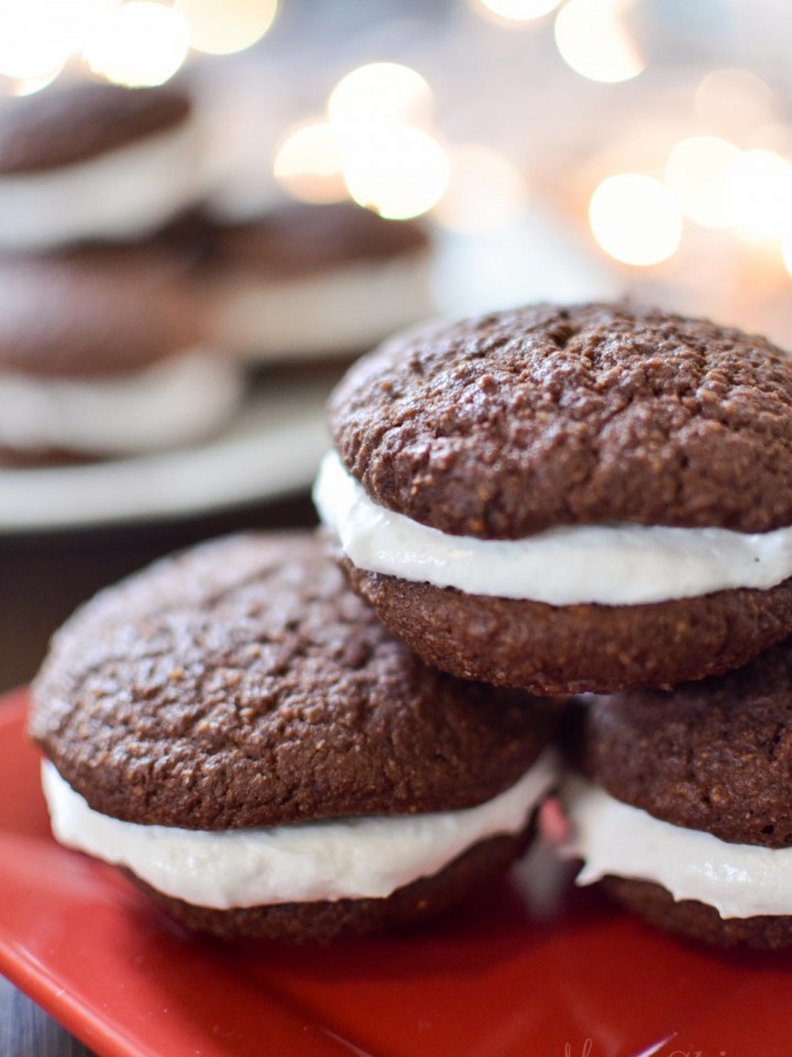 Peppermint whoopie pies on a red plate.