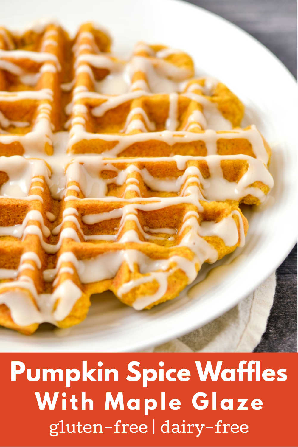 Maple glaze drizzled over gluten-free pumpkin waffles.