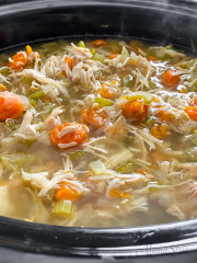 Slow cooker chicken soup with vegetables. easy to make chicken soup.