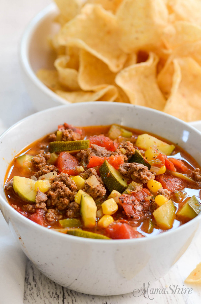 Gluten-Free taco soup with veggies in a serving bowl.