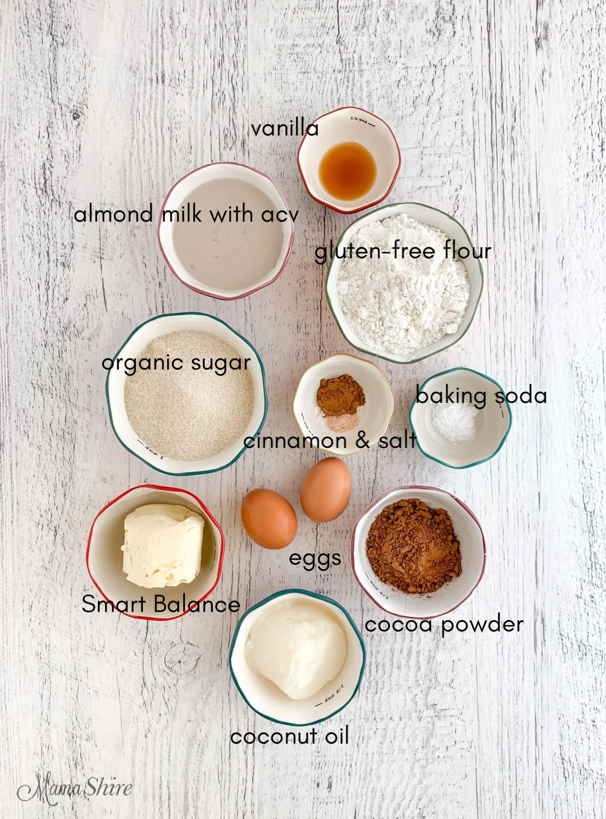 Ingredients placed in small prep bowls that are for a gluten-free Texas sheet cake.